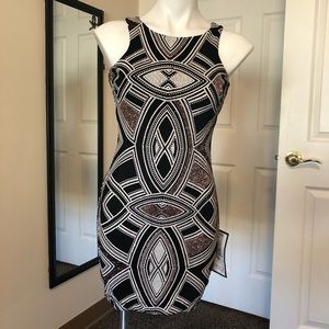 Brand new black/white dress with gold sparkles